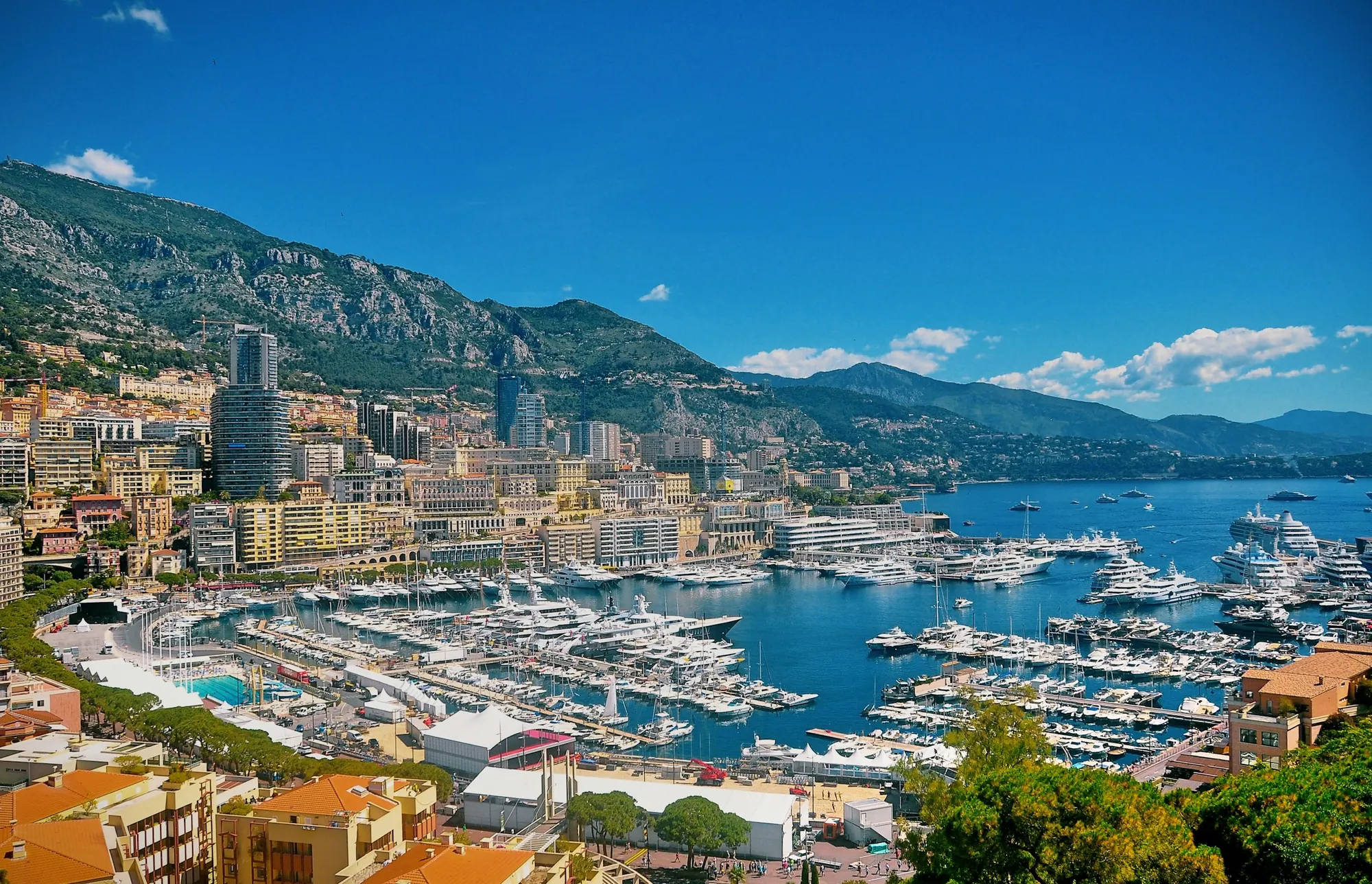 Aerial view of Monaco, its harbour and the hills above the Mediterranean